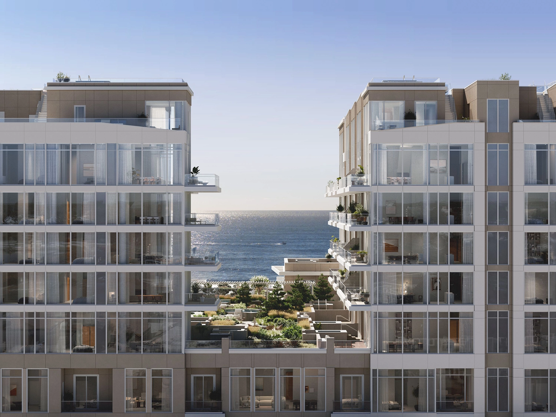 Exterior of LIDO oceanfront condos for sale in NJ with green space and direct Atlantic Ocean views.