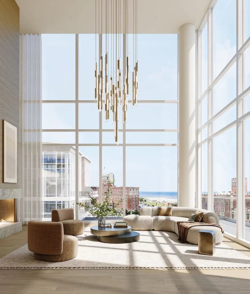 Oceanfront Great Room at LIDO condominiums with floor-to-ceiling windows and panoramic ocean views.